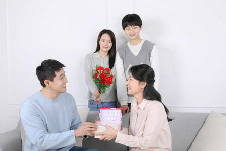 Asian Korean Family_celebration of parents day with giftsの写真素材