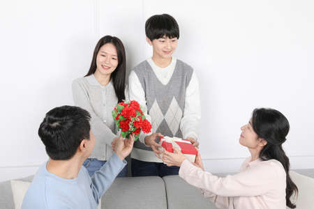 Asian Korean Family_Photo with carnations and gifts