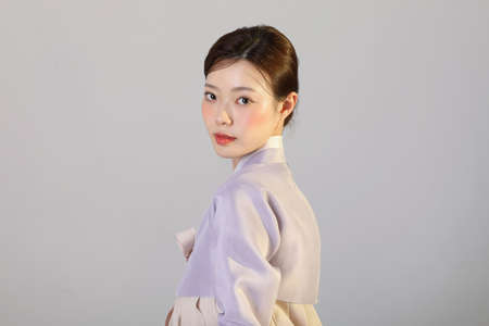 spring beauty concept, beautiful korean woman wearing hanbokの写真素材