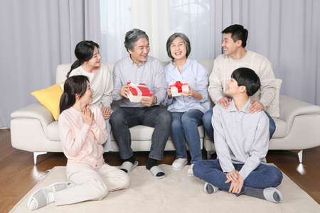 Asian Korean Family_giving gifts for Mother's Dayの写真素材
