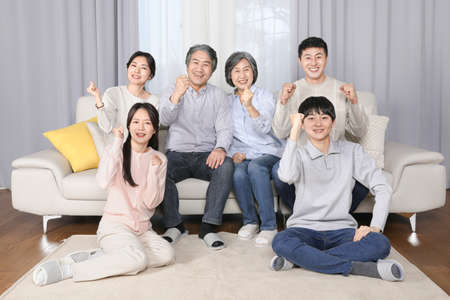 Asian Korean family_cheer up poseの写真素材
