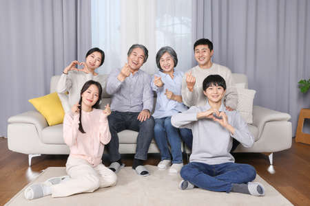 Asian Korean family_Hand heart poseの写真素材