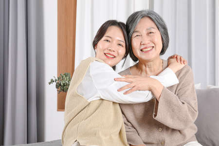 Asian Korean family_Grandmother and grandchild huggingの写真素材