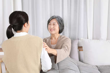 Asian Korean Family_grandson visiting grandmotherの写真素材