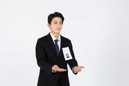 Asian Korean young man and woman startup concept wearing smart business suit_a young man presenting