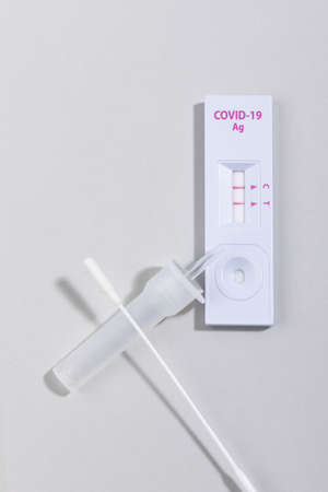 covid virus test kit with positive resultの写真素材
