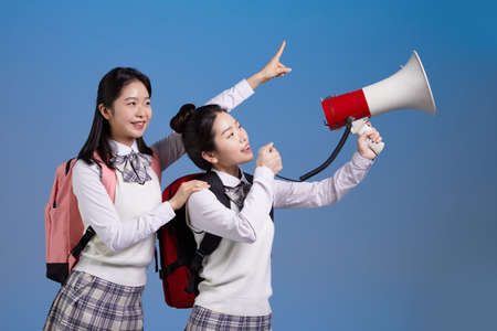 mz generation Asian Korean female hipster influencer, creator concept : holding a loudspeakerの写真素材