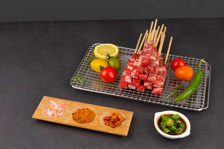 raw lamb skewerの写真素材