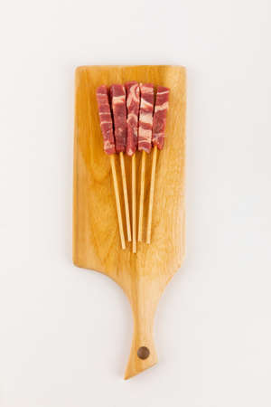 raw lamb skewerの写真素材