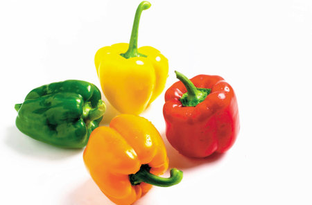 Capsicums against white background