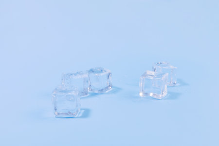 creative summer photo of ice, blue background