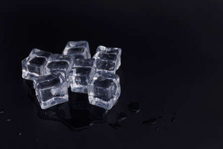 creative summer photo of ice, black background