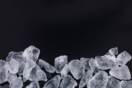 creative summer photo of ice, black background