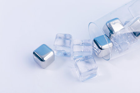 creative summer photo_ice and stainless ice, white backgroundの写真素材