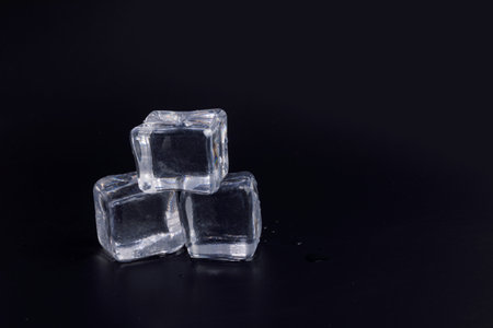 creative summer photo of ice, black backgroundの写真素材