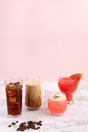 Summer drink background with watermelon, peach ade or juice, iced americano or brewed coffee with...