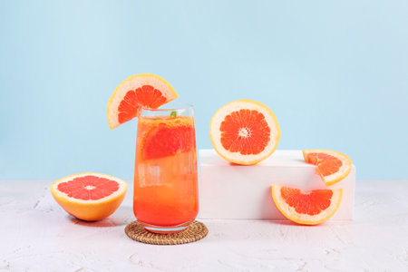 summer background with grapefruit ade, juice drink with grapefruitsの写真素材