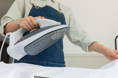 aesthetic laundry concept_ironing shirtsの写真素材