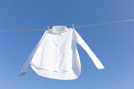 aesthetic laundry concept_shirts hung on a clotheslineの写真素材