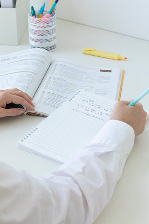 studying at home, study desk setup_studying while taking notes