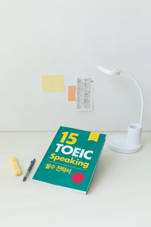 studying at home, study desk setup_dictionaries and workbooksの写真素材