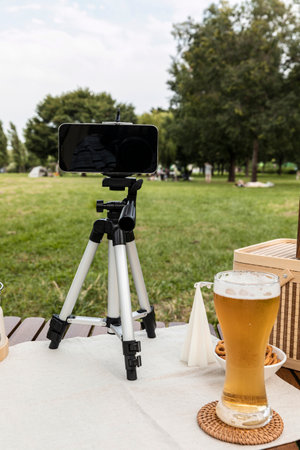 camping mood aesthetics_filming using smartphoneの写真素材