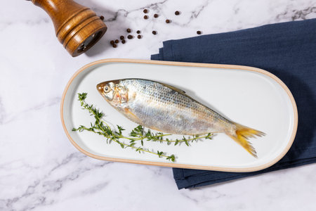 gizzard shad fish in a bowlの写真素材