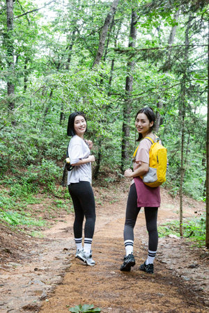 korean young women hiking and plogging_trekking mountain