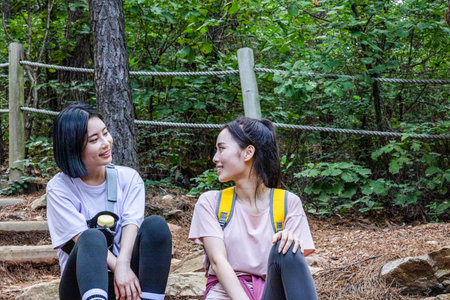 korean young women hiking and plogging_restingの写真素材