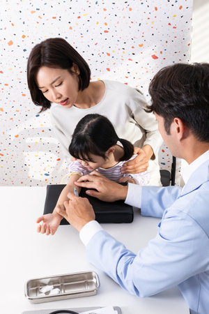 Korean Asian child in doctor clinic hospital