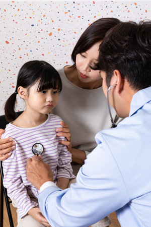 Korean Asian child in doctor clinic hospital