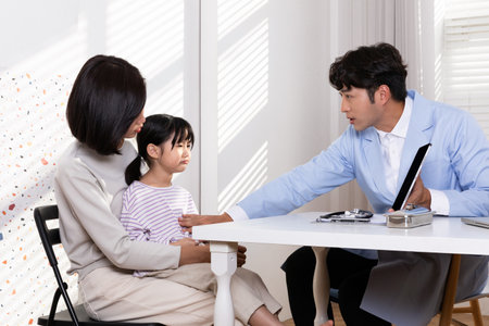 Korean Asian child in doctor clinic hospitalの写真素材