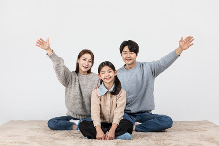 happy Asian Korean family, isolated in white background-reading a book