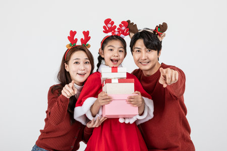 happy Asian Korean family in Christmas conceptの写真素材
