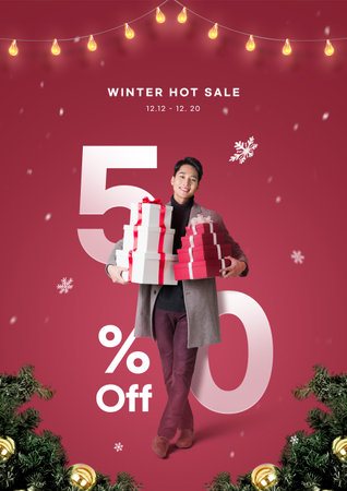 winter shopping sale event poster-Asian Korean man holding gift boxesの写真素材