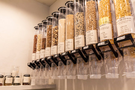 eco friendly habits hand gesture_nuts refill in zero waste shopの写真素材