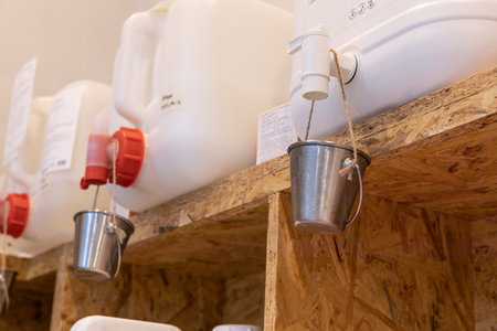 eco friendly habits hand gesture_detergent refill station