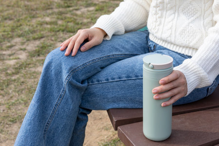 eco friendly habits hand gesture_using tumblerの写真素材