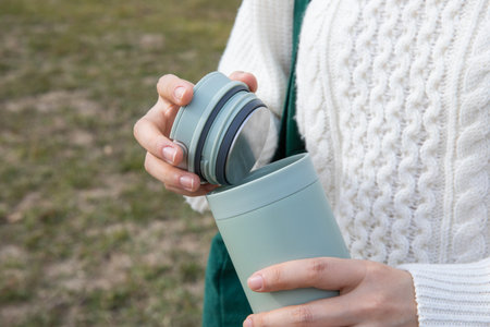 eco friendly habits hand gesture_using tumblerの写真素材