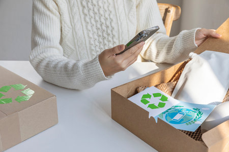 eco friendly habits hand gesture_eco friendly delivery packagingの写真素材
