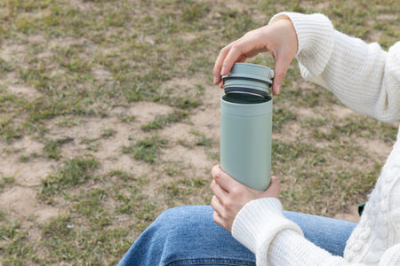 eco friendly habits hand gesture_using tumblerの写真素材