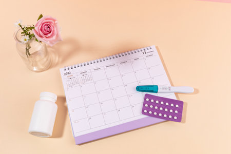 woman menstrual products_ calender and pregnancy testの写真素材