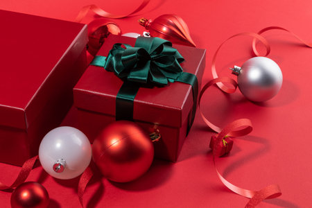 christmas decorations and display background_gift box and red ribbon ornamentの写真素材