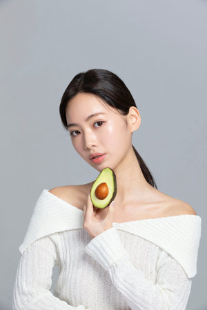 beautiful young Korean Asian woman portrait studio photo in winter skin beauty and cosmetics...