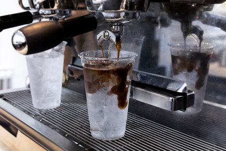 barista brewing, preparing coffee in cafeの写真素材