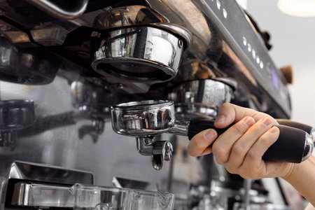 barista brewing, preparing coffee in cafeの写真素材