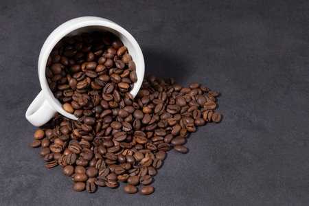 creative concept photo of coffee beans and coffee cupsの写真素材