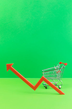 conceptual creative photo of monetary inflation, economic recession, crisis_shopping carts and rising arrowsの写真素材