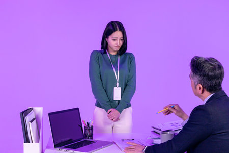 relationship and conflict between younger and older workers concept, Korean Asian young woman and...