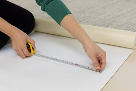 DIY interior hand motion, closeup_wallpaper length measurement